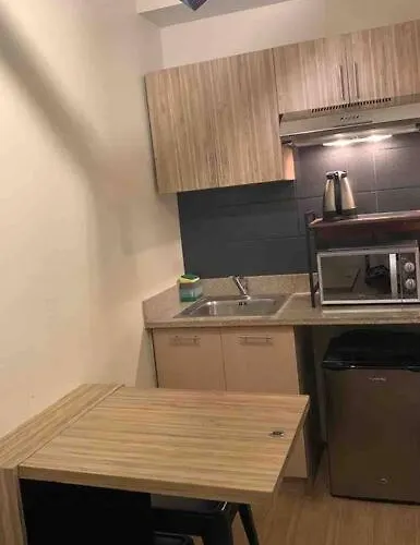 Apartment Flat Cami: Scandustrial Design 1-br W/ Balcony Manila