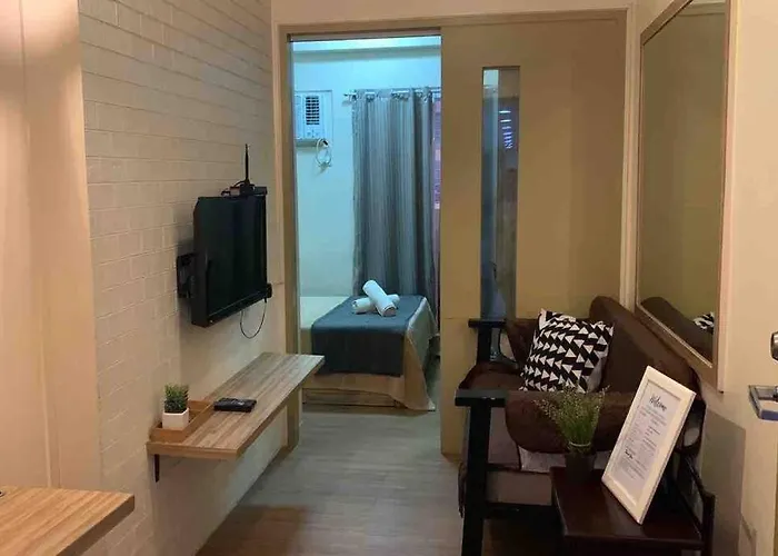 Flat Cami: Scandustrial Design 1-br W/ Balcony Manila